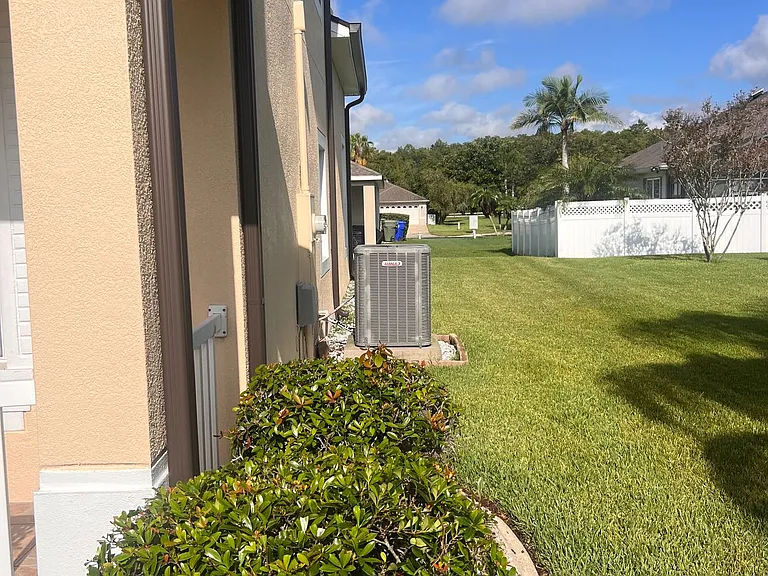 Well-maintained side area with direct access to backyard and utilities.