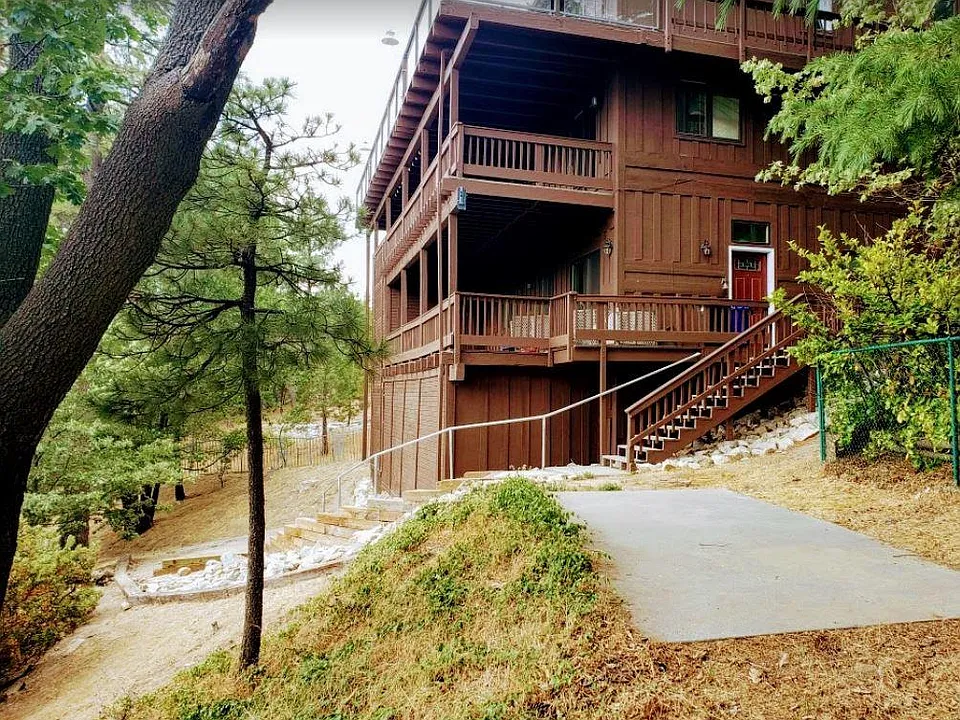Stairs to bottom floor apartment entrance.