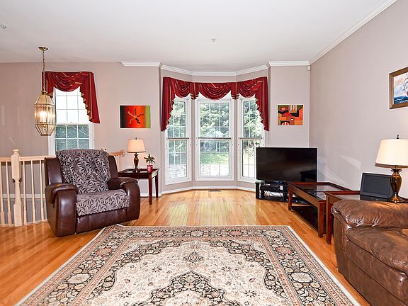 Living room - with bay window and hardwood floors