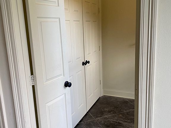 Laundry room/office to right as enter through front double doors