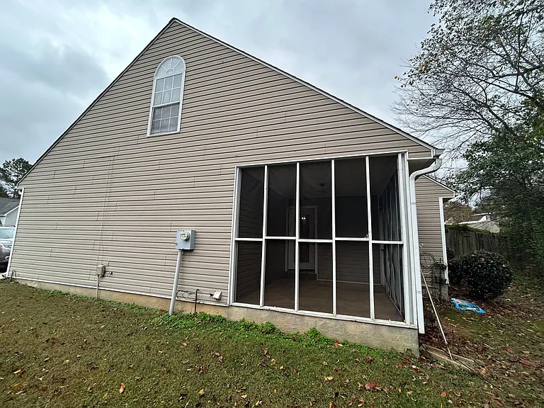 Side view showing screened in porch