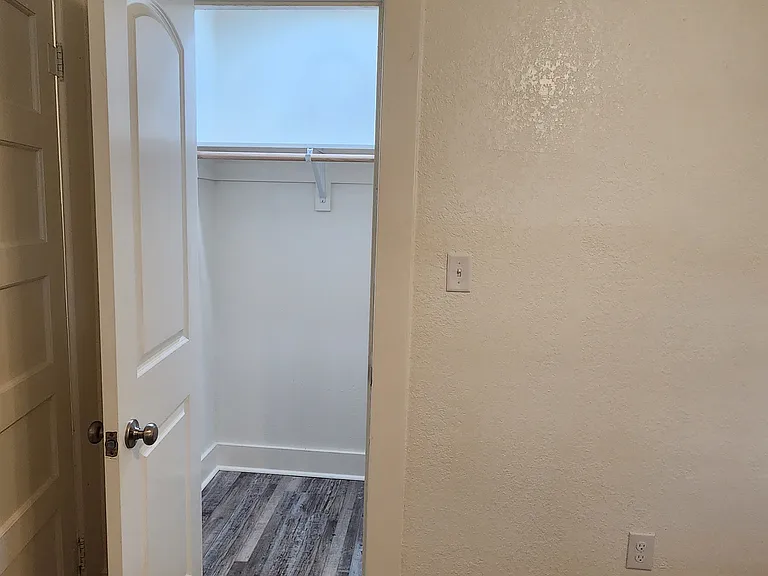Back bedroom lighted closet.