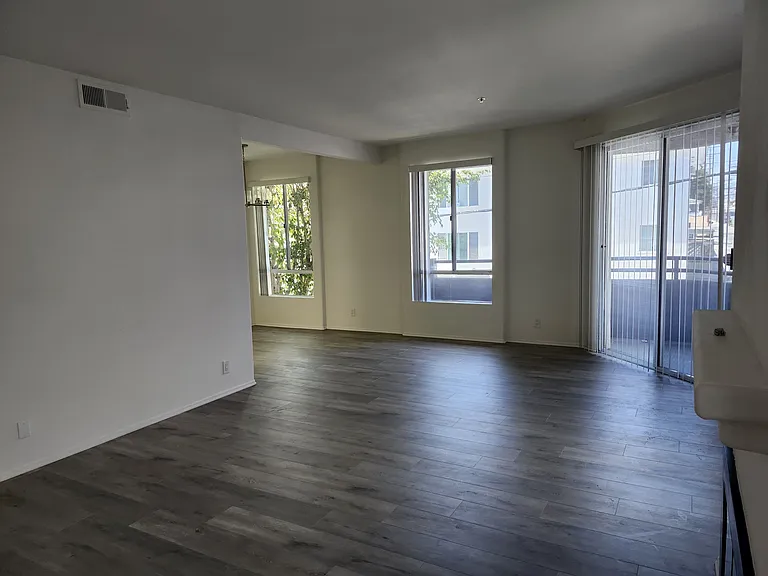 Lots of light, wrap-around balcony.