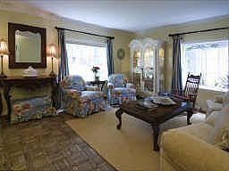 LIVING ROOM 15 X 19 - Nice light filled living room with crown moldings, parquet floors and two larg