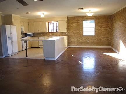Kitchen & Dining Room
						:
						Spacious kitchen and dining room. Notice the lovely exposed brick walls ...