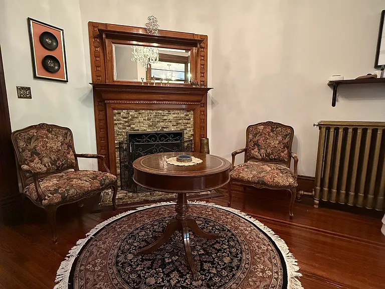 Center parlor seating area between living room and kitchen/dining area