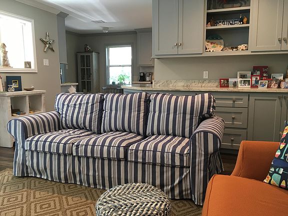 Living room opens to kitchen. Breakfast room adjacent to kitchen