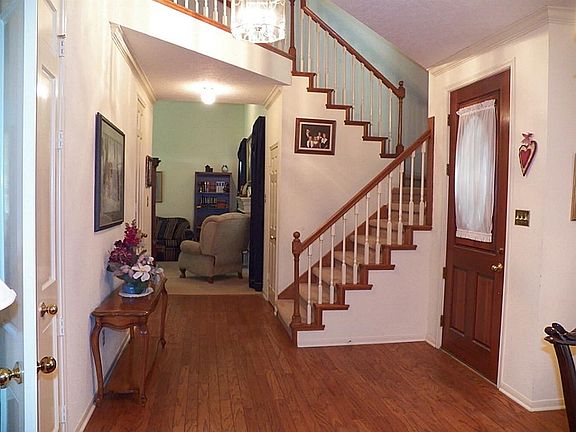 Spacious entryway. Convenient half bath is off the hallway.