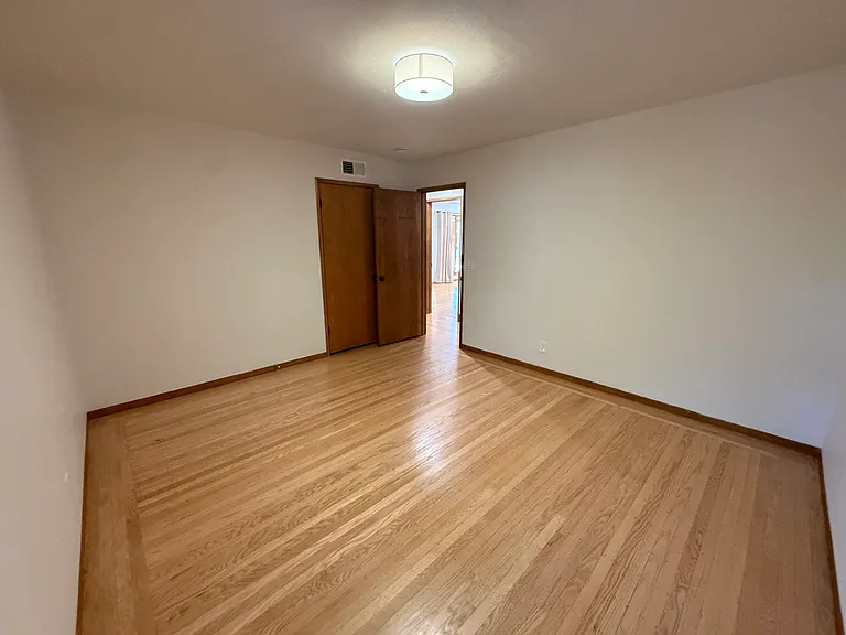 Bedroom #2 has one window and a single door closet.