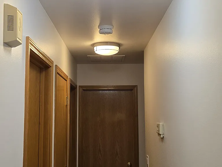 Hallway to bedrooms bathroom on the left