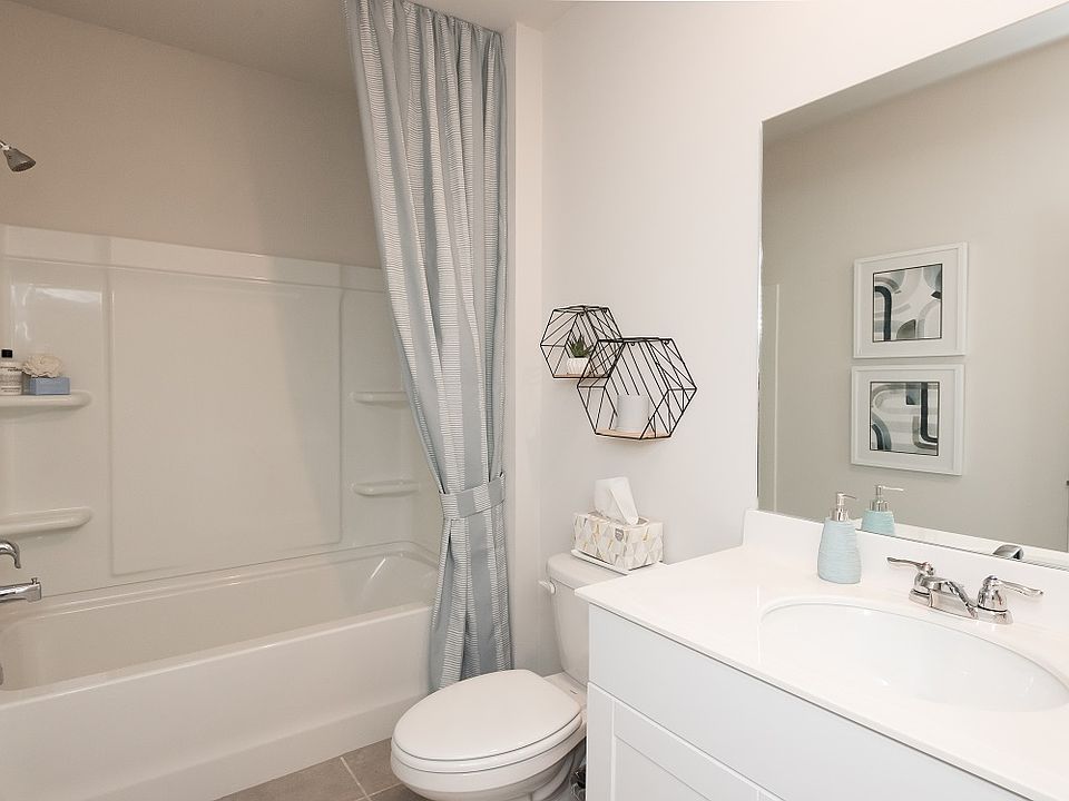 The downstairs full bedroom and bathroom are perfect for a guest suite.