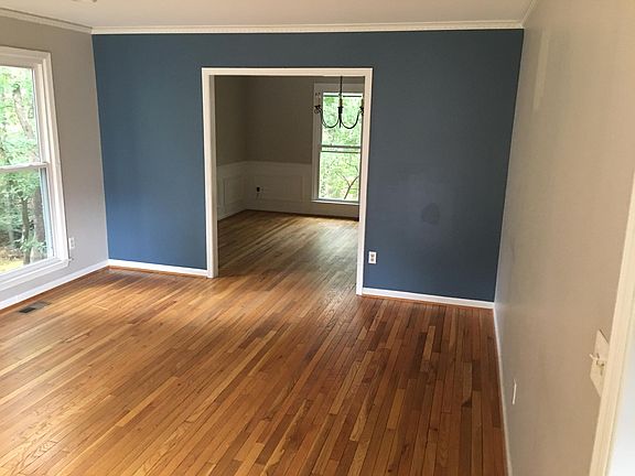 Living room looking into dining room.