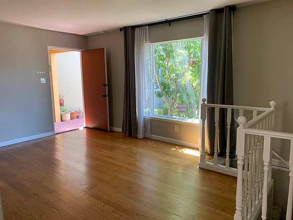 Living room with large dual pane window
