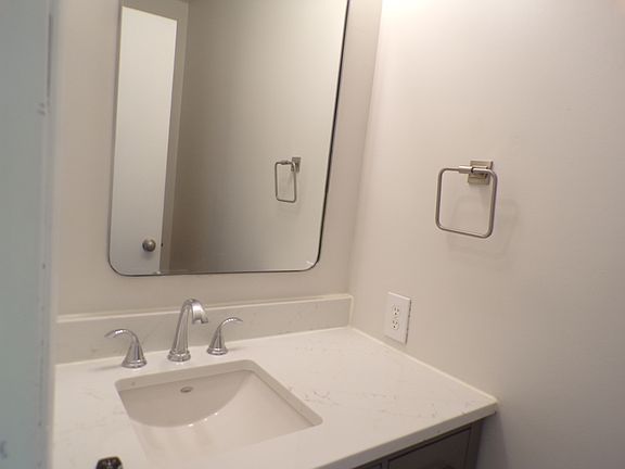 1/2 bath at front entry