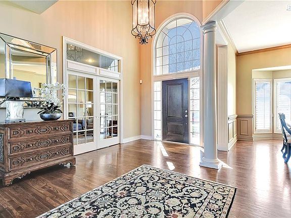 As you enter the house you can feel/see the quality and pride of ownership, glass pocket doors to study, dining is open with pretty columns.