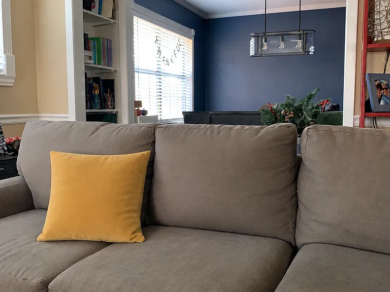 A book nook and view into the dining room