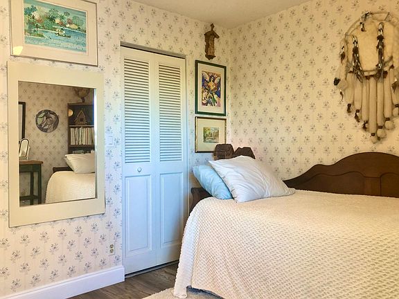 Secondary bedroom with walk-in closet