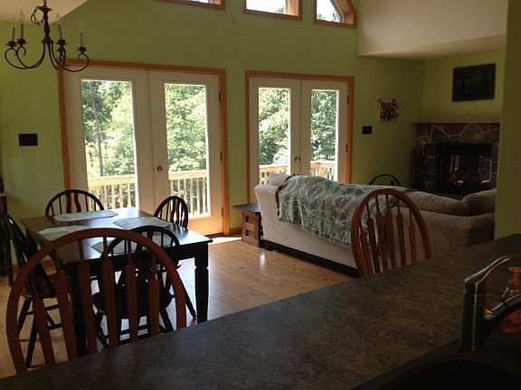 Open dining / living with door to the upper deck