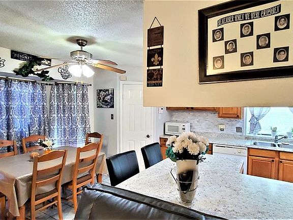Breakfast room is spacious plus the counter is also a breakfast bar...lots of room and a walk-in pantry.