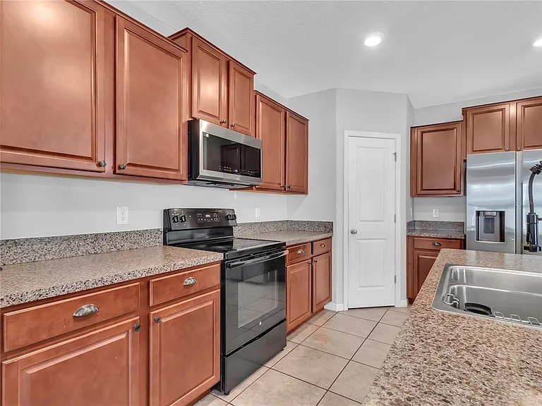 5025 Brickwood Rise Dr — Photo 10