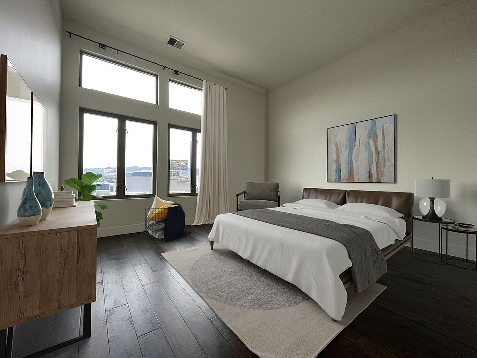 Large bedroom with high ceilings