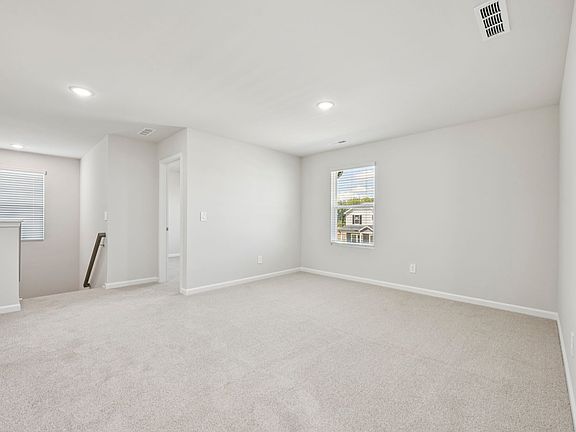 Loft in the Chatham floorplan at a Meritage Homes community in Garner, NC.