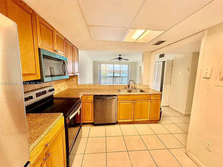 1591 NE Miami Gardens Dr #205 — Photo 11
