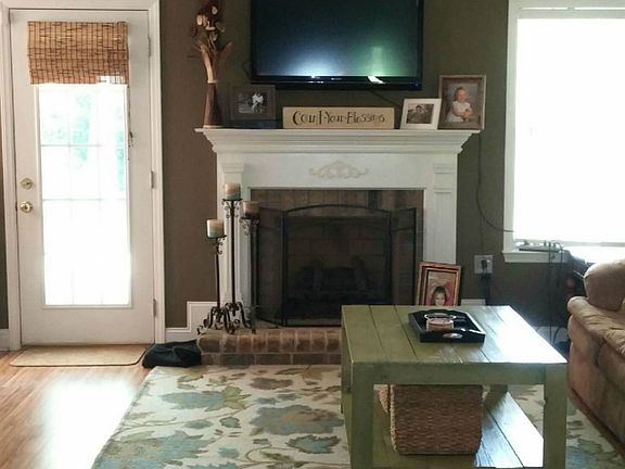 Vaulted ceilings and gas logs in great room