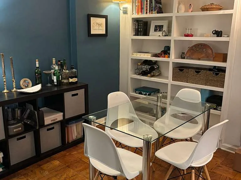 dining area focus on bookshelf