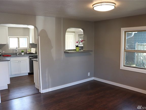 Light and Bright Fully Remodeled Kitchen.  Pass Thru Window to Your Potential Dining Area.  Lots of Windows in this Home to Brighten Your Day!