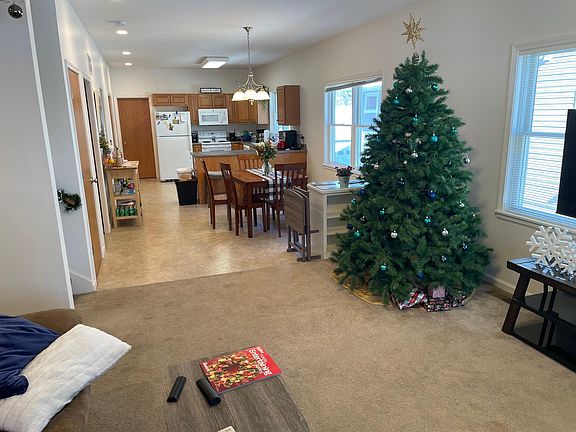 View from living room into dining and kitchen.