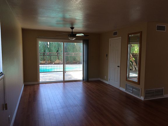 family room with 2 entrance to backyard