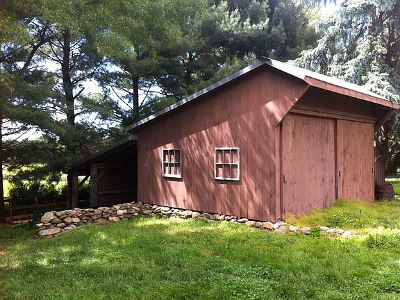 Tractor & mower shed