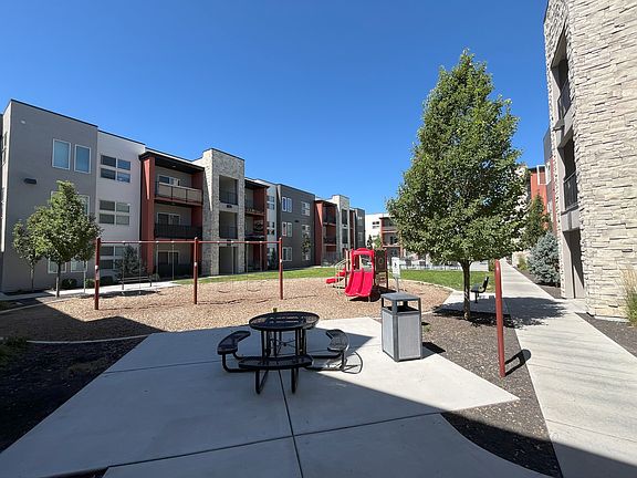 Enjoy the well maintained green space, as well as a safe playground area with picnic tables nearby.