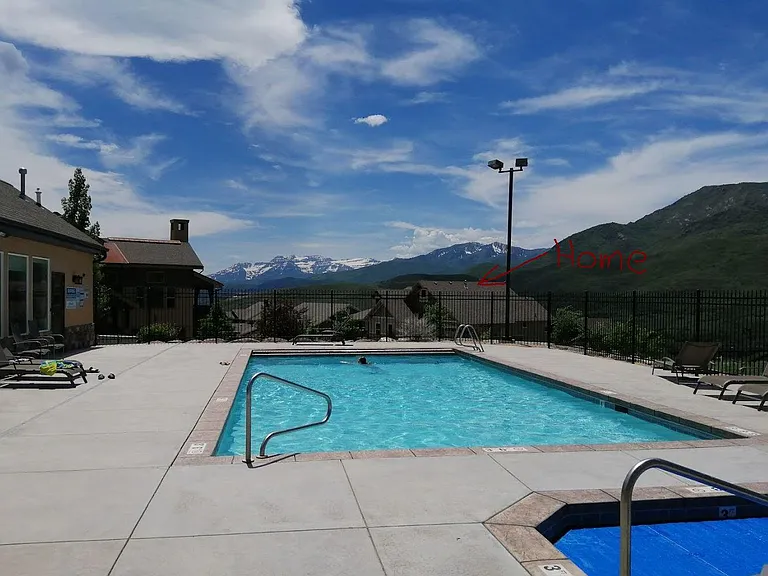 Community Pool & Jacuzzi showing proximity of home to pool