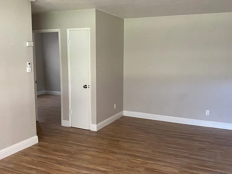 living room with view towards hallway to bedrooms