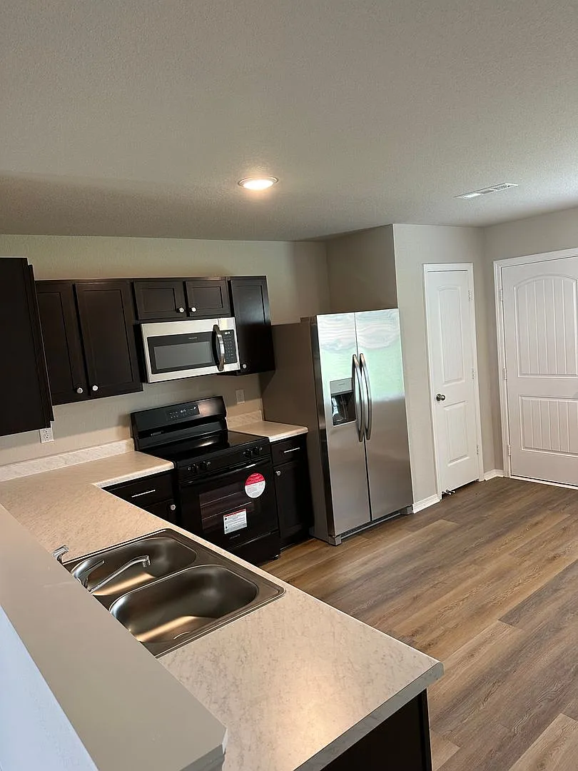 Pre-Leasing Now! Discover Spacious Living in This 4-Bedroom, 2-Bath Cabot Home — Photo 4