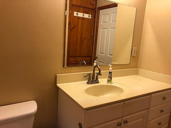 Full bathroom with tub.