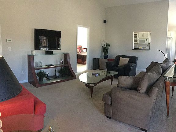 Den with vaulted ceilings