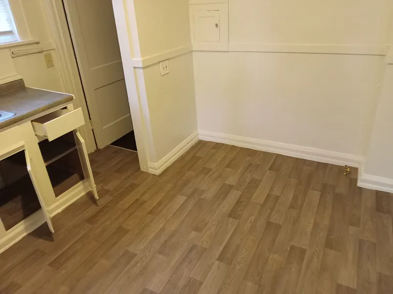 Kitchen gas stove hook-up with refrigerator plug to the right