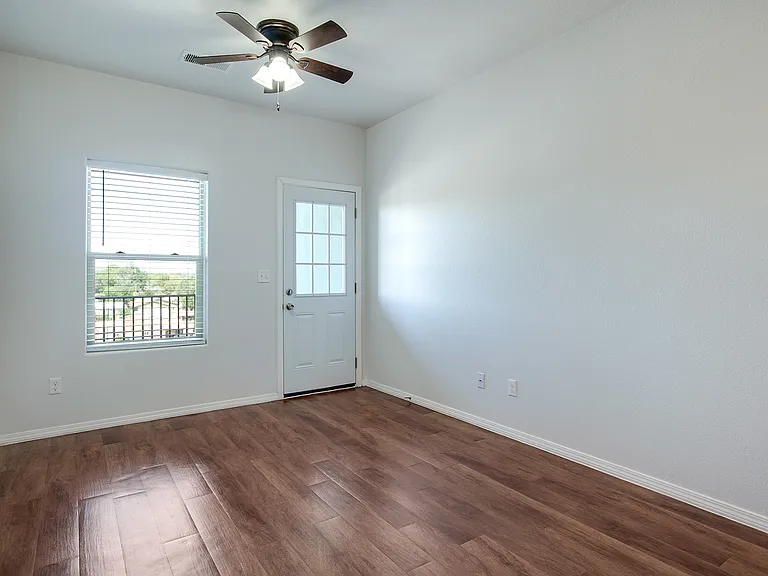403 - top floor living and balcony entrance