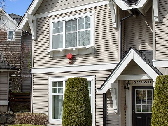 Sleek and elegant 2 bedroom, 2 bath corner townhome with an ambiance of comfort and quality. 