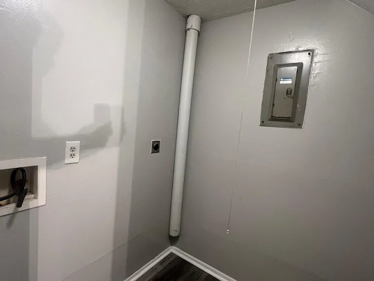 Separate Laundry Room!