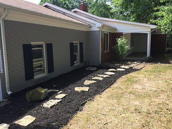 Front of home showing new landscaping