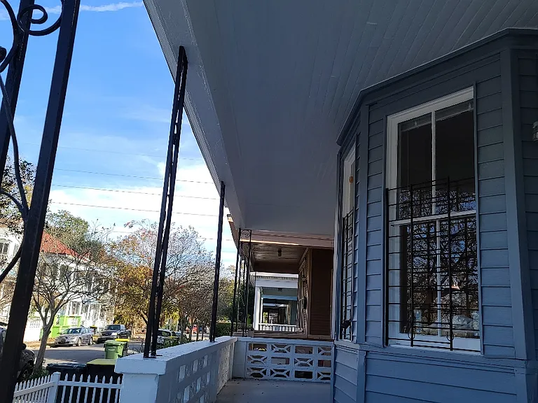 Front porch is spacious and tenants are welcome to put out some seating!