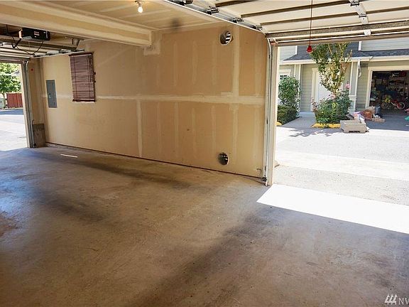 Two car garages with two different entrances.