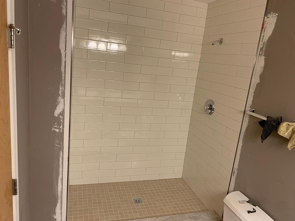 Master, step-up shower. Newly remodeled and tiled. New glass shower doors, paint and towel racks coming. Master will be brushed Nickel hardware. Koehler shower head to be installed.