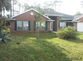 18 Porpoise Ln, Palm Coast, FL 32164