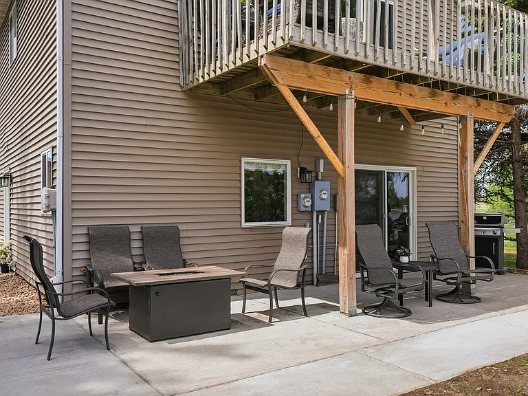 Patio w/ BBQ gas grill for cookouts & chat height gas fireplace w/ warm and cozy seating for 6!