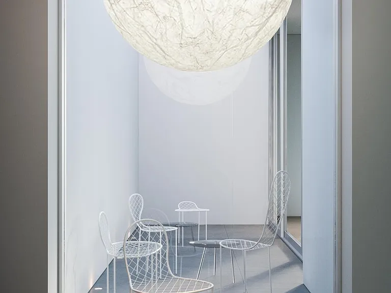 Elegant Open-air Central Courtyard_ This open-air central courtyard provides a serene atmosphere with abundant natural lighting and cross-ventilation of fresh air throughout the residence.